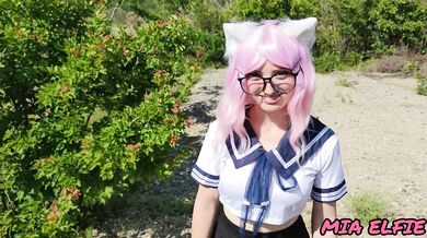 Sexy schoolgirl with ears in uniform walks down the abandoned road
