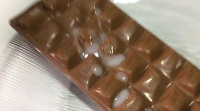 Stepdaughter eating chocolate with cum
