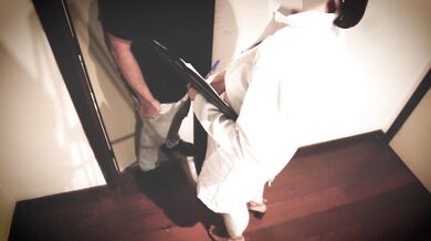 A married nurse helps a patient at the sperm clinic.