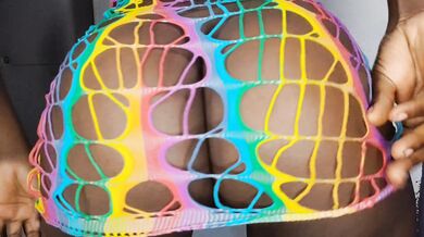 Big ebony milf shows bug oiled ass in rainbow lingerie