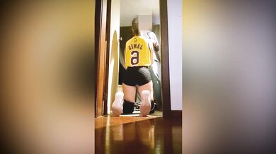 Basketball player gives coach a blowjob in the bathroom at the back of the gym.